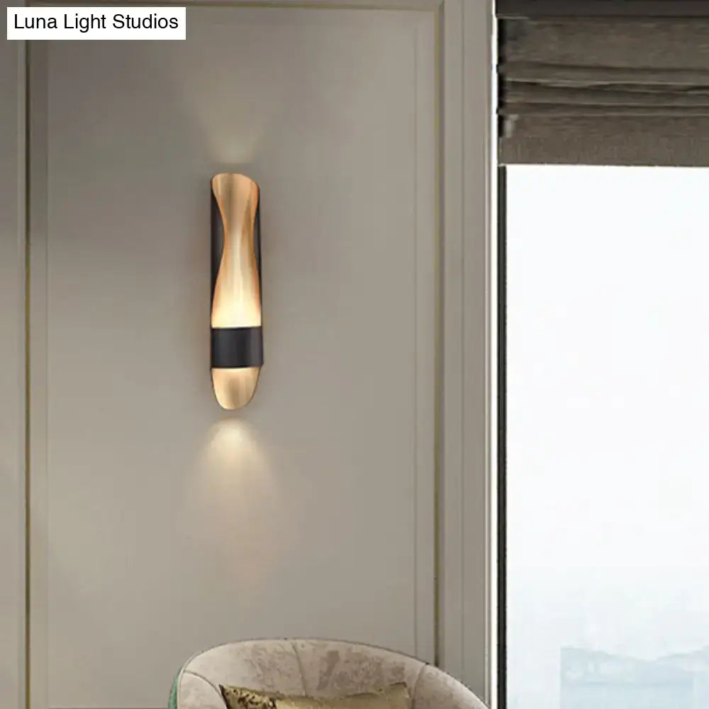 Black twisted LED wall sconce by Decorbites on Tampa Home & Garden Store