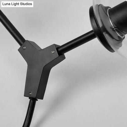 Black Gold Clear-Glass Wall Sconce with adjustable black metal arm by Decorbites on Tampa Home & Garden Store