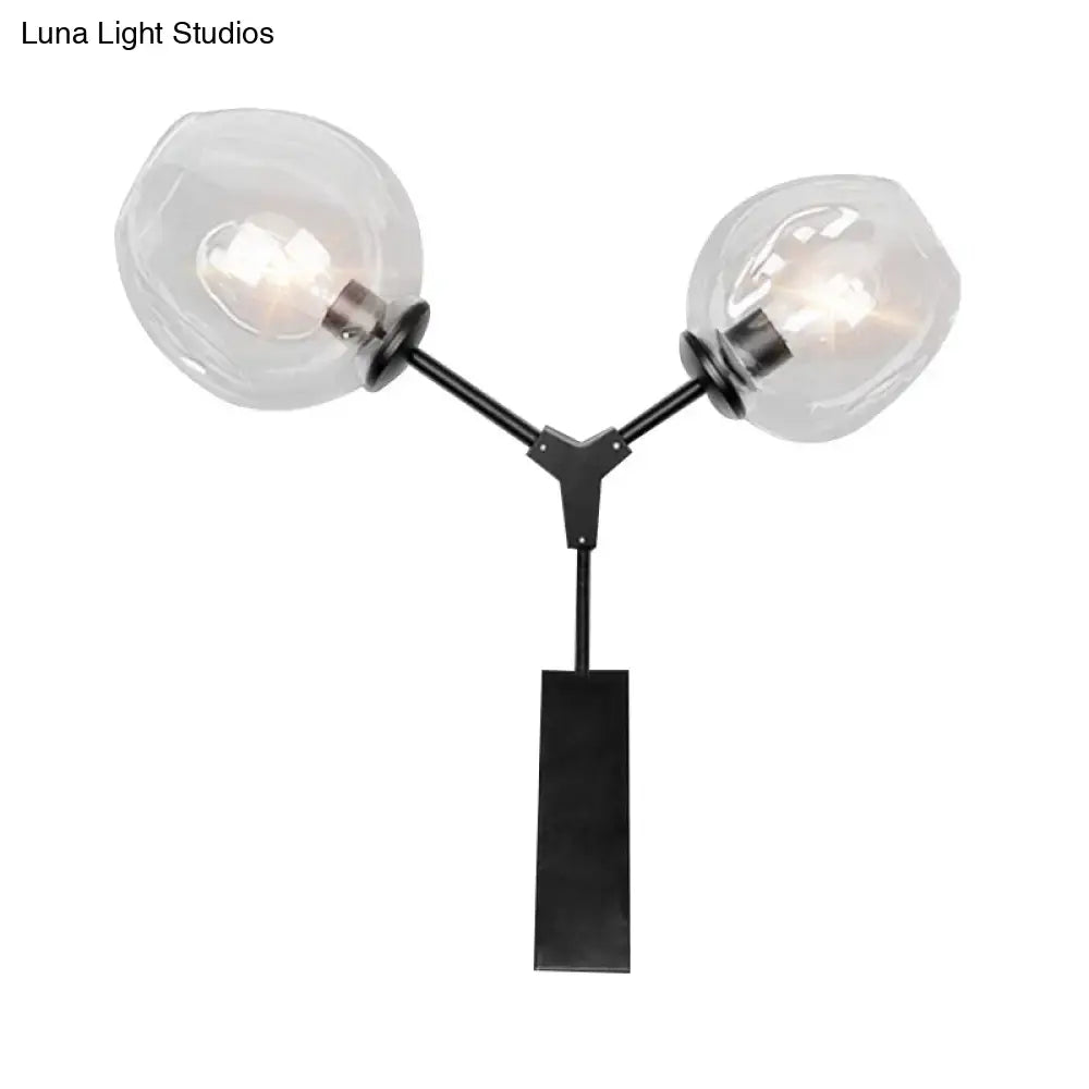 Black Gold Clear-Glass Wall Sconce with dual glass globes on black metal arms Decorbites on Tampa Home & Garden Store