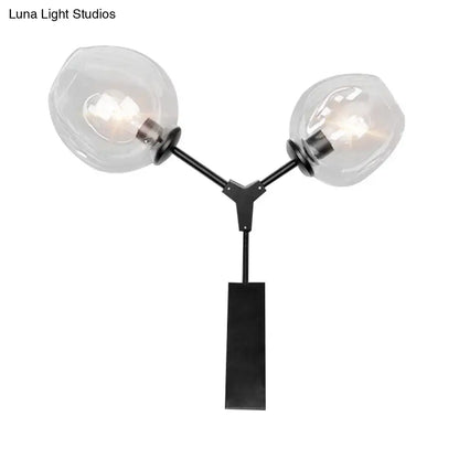 Black Gold Clear-Glass Wall Sconce with dual glass globes on black metal arms Decorbites on Tampa Home & Garden Store
