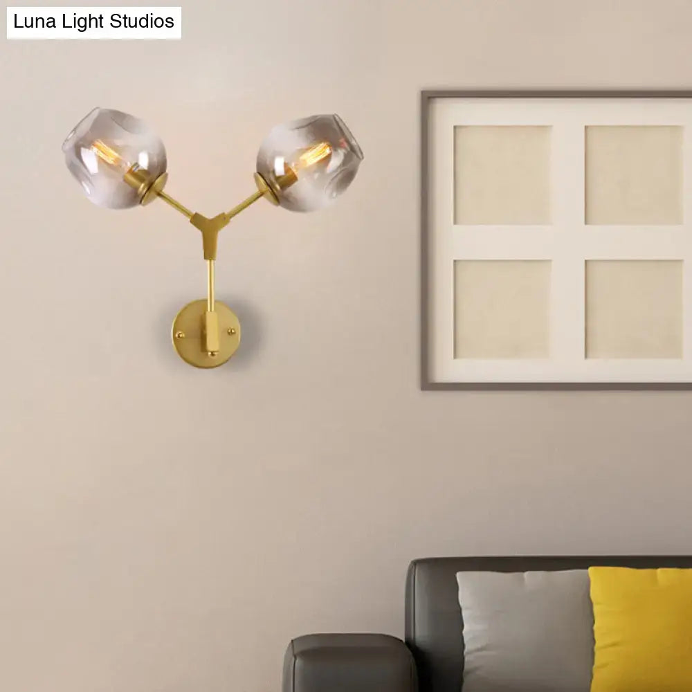 Black Gold Clear-Glass Wall Sconce with dual clear-glass globes on brass arm on Tampa Home & Garden Store