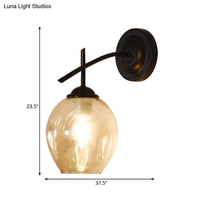 Black Gold Clear-Glass Wall Sconce amber glass globe curved black-gold arm Decorbites on Tampa Home & Garden Store
