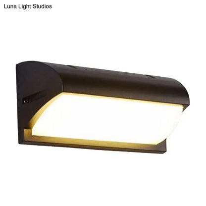 Black LED flush wall lamp with curved housing, wall-mounted by Decorbites on Tampa Home & Garden Store
