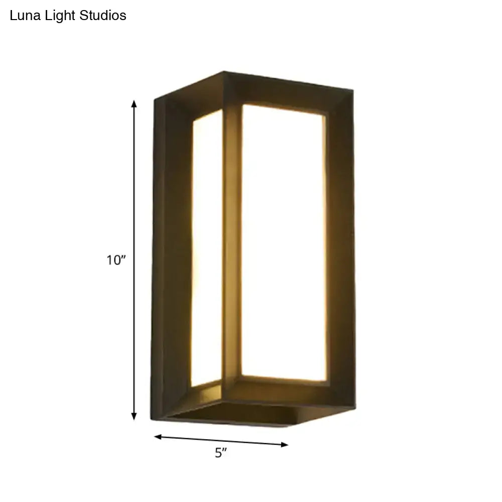 Black LED flush wall lamp with metal frame and lit inner panel on Tampa Home & Garden Store