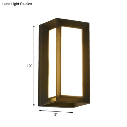 Black LED flush wall lamp with metal frame and lit inner panel on Tampa Home & Garden Store