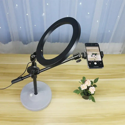 Black round vanity light with adjustable phone mount on a metal stand Decorbites on Tampa Home & Garden Store