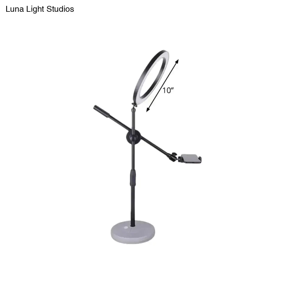 Black round vanity light by Decorbites with 10-inch ring and adjustable arm on Tampa Home & Garden Store