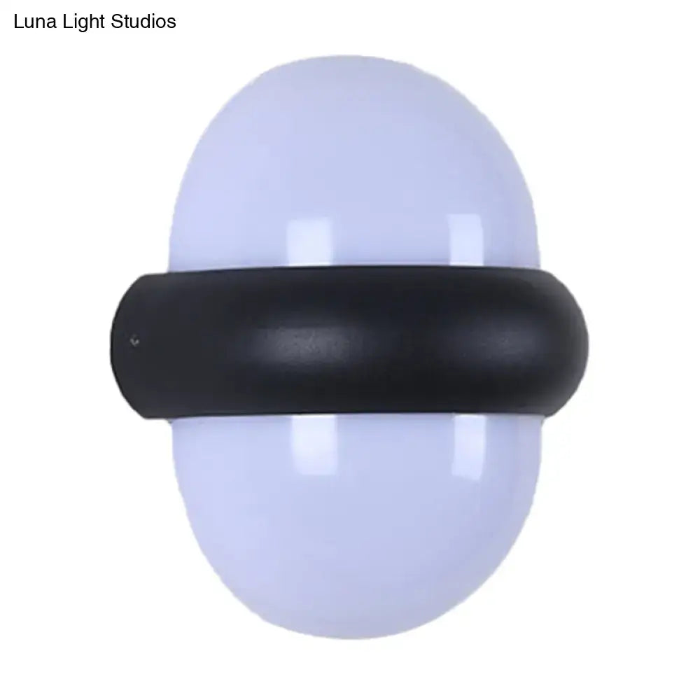 Black semi-sphere outdoor light with white dome on Tampa Home and Garden Store