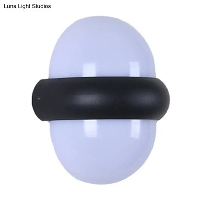 Black semi-sphere outdoor light with white dome on Tampa Home and Garden Store