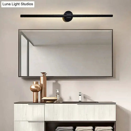 Contemporary black slim wall light wall-mount bar above bathroom mirror with white vanity on Tampa Home & Garden Store