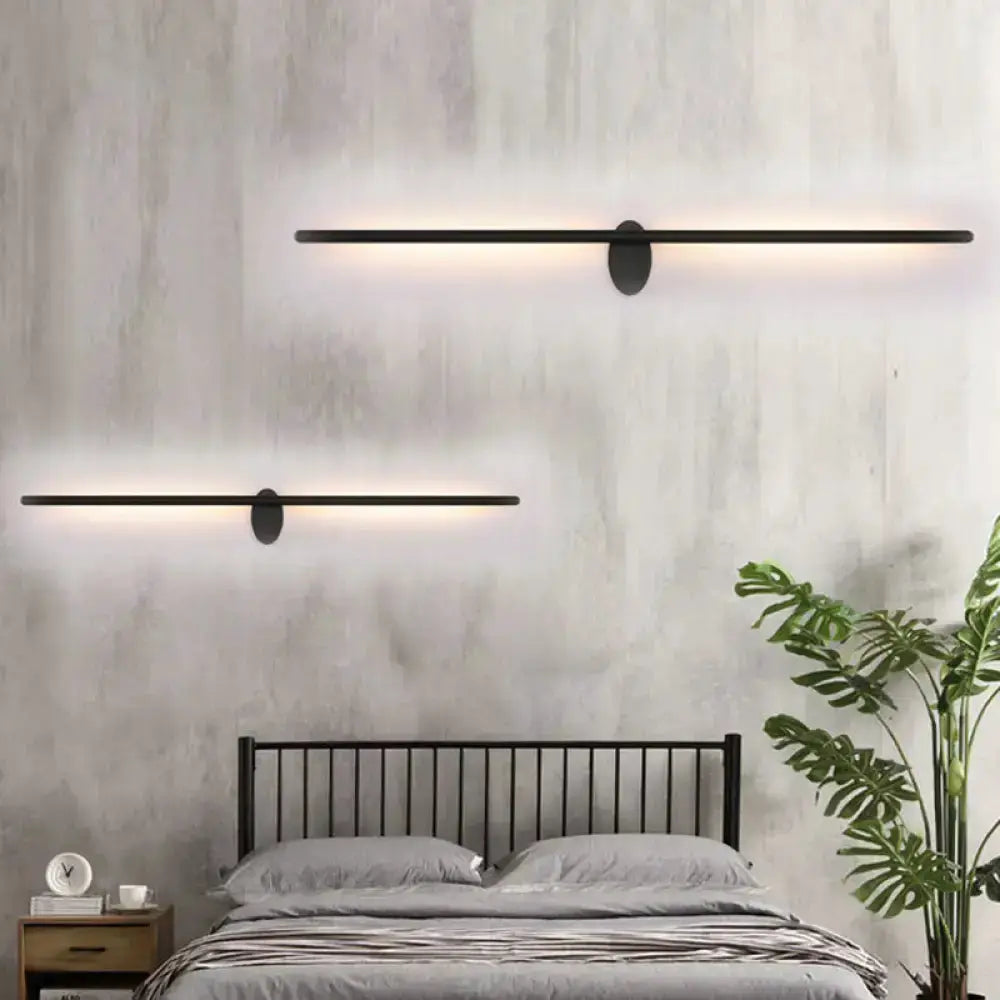 Contemporary black slim wall light pair for bedroom by Decorbites with warm LED glow on Tampa Home & Garden Store