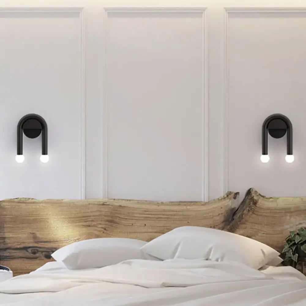 Pair of black U-shaped wall lights by Decorbites for bedroom décor on Tampa Home & Garden Store