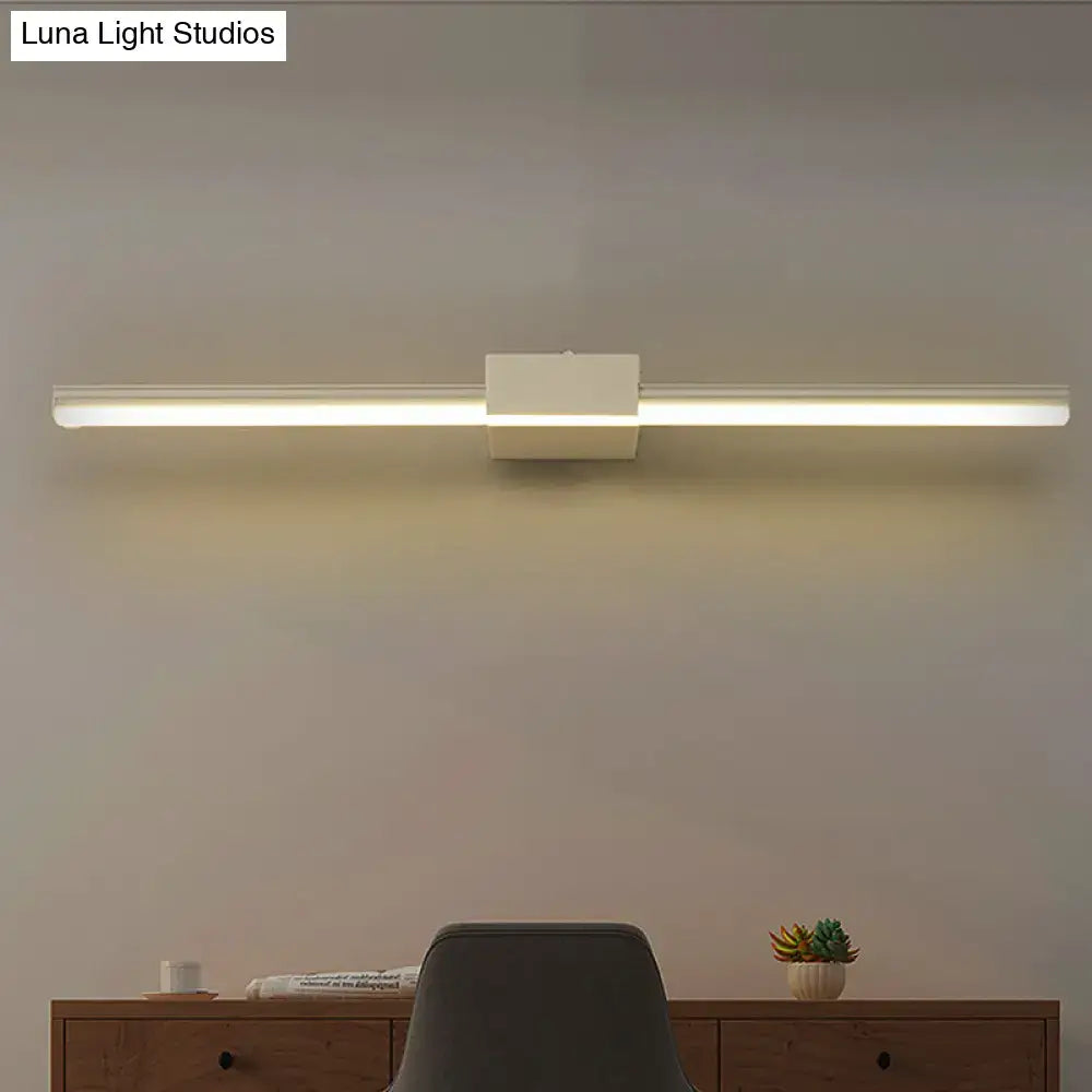 Decorbites white linear wall light with center block, modern LED fixture above desk on Tampa Home & Garden Store