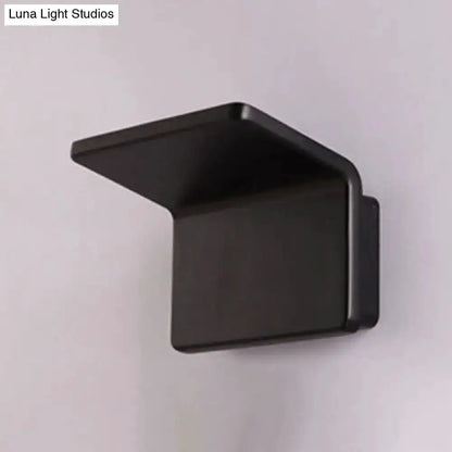 Contemporary black LED wall sconce with angled shade by Decorbites on Tampa Home & Garden Store