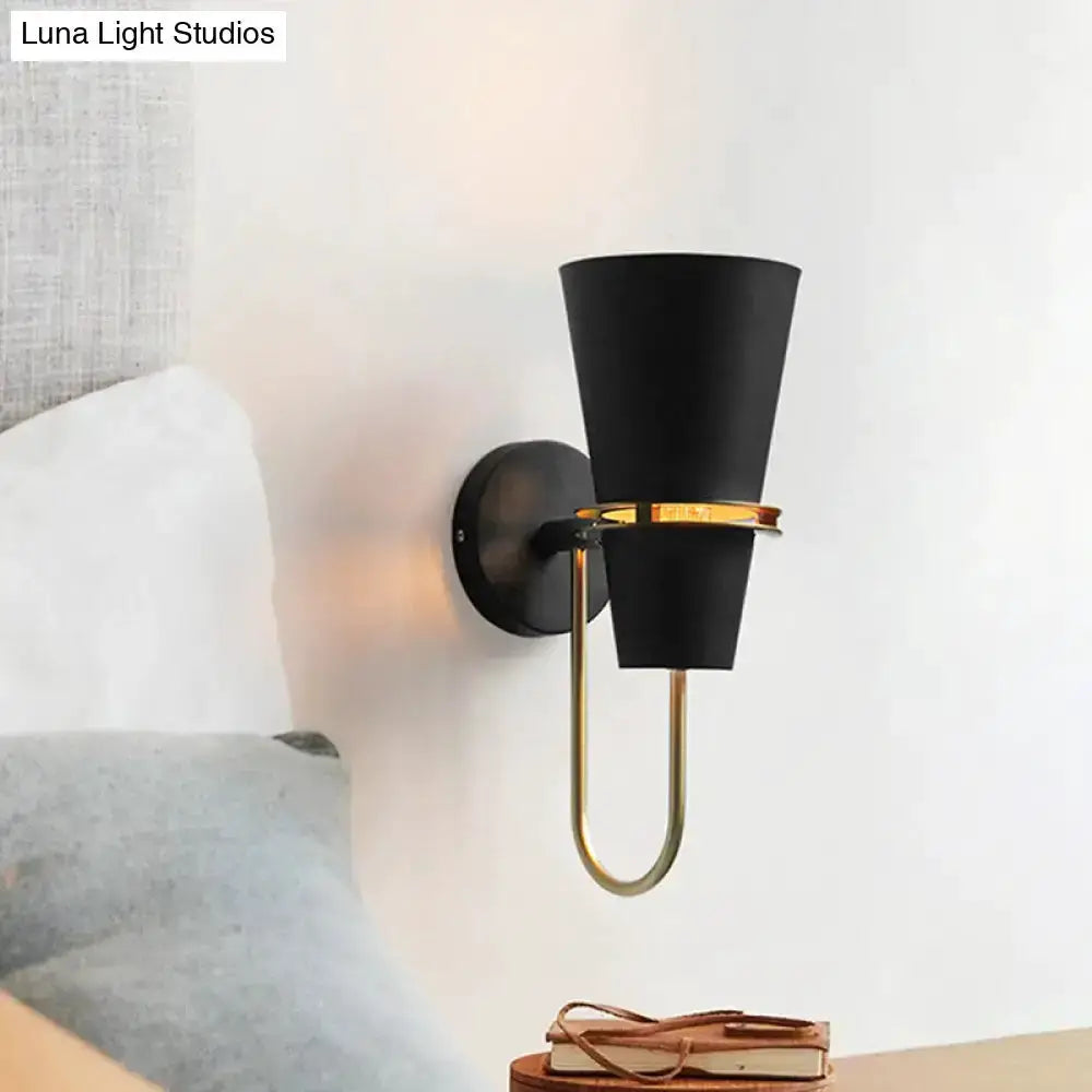 Wall sconce light with black flared shade and gold U-arm on a backplate, Luna Light Studios on Tampa Home & Garden Store