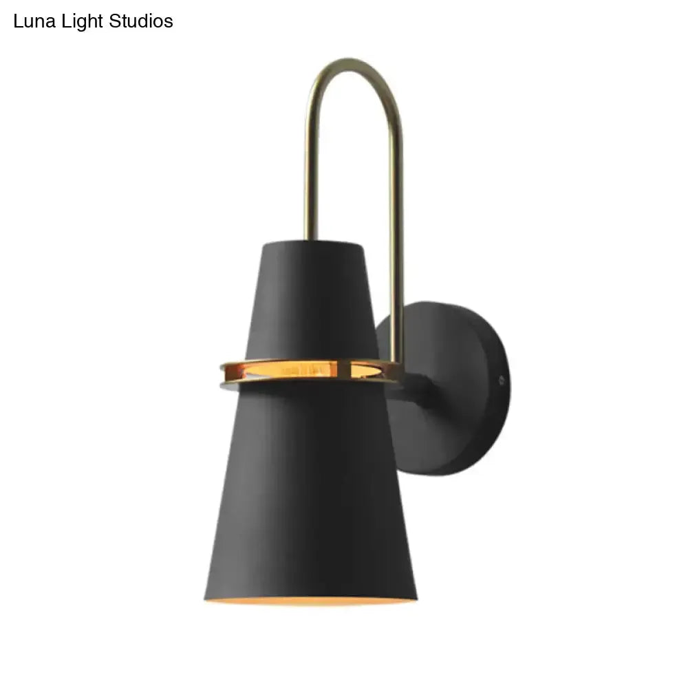 Contemporary black flared wall sconce with gold ring accent and curved brass arm Decorbites on Tampa Home & Garden Store