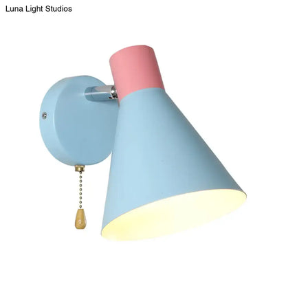 Blue pink metal wall sconce by Decorbites with conical blue shade and pink accent, pull-chain on Tampa Home & Garden Store