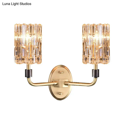 Brass crystal two-light bedside sconce by Decorbites with glass prism shades on Tampa Home & Garden Store