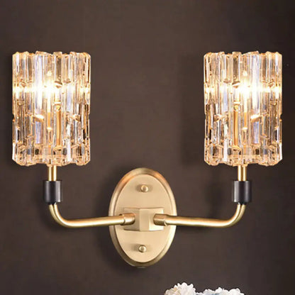Brass crystal bedside sconce with dual glass block shades and oval backplate on Tampa Home & Garden Store