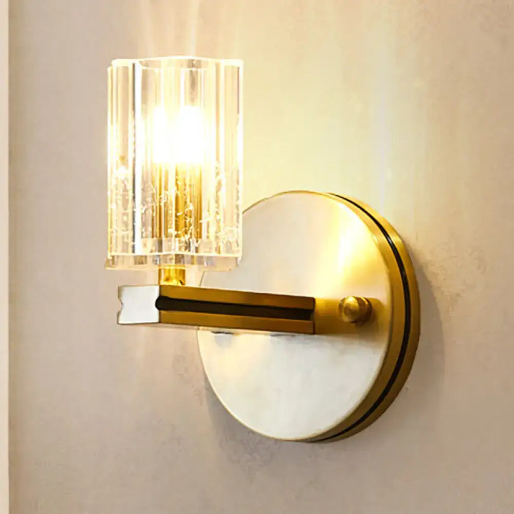 Brass crystal cylinder sconce with LED-compatible bulb and clear shade on Tampa Home & Garden Store