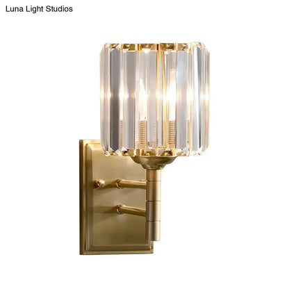 Brass prismatic crystal wall sconce with a clear glass shade Decorbites on Tampa Home & Garden Store
