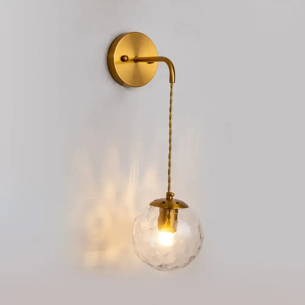Gold Dimpled Glass Wall Lamp Decorbites, brass sconce with hanging glass globe on Tampa Home & Garden Store