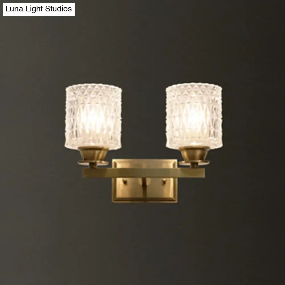 Brass lattice glass wall light by Decorbites, dual-armed sconce with textured glass shades on Tampa Home & Garden Store
