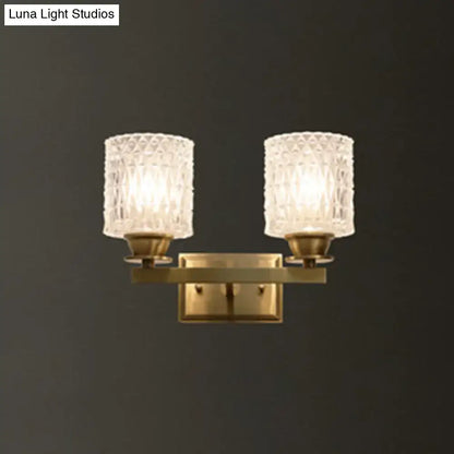 Brass lattice glass wall light by Decorbites, dual-armed sconce with textured glass shades on Tampa Home & Garden Store