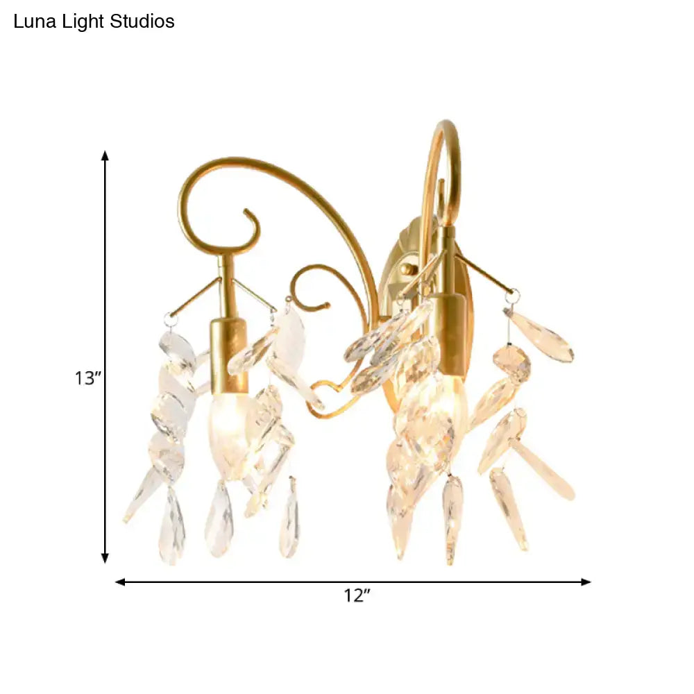Brass teardrop crystal sconce with hanging prisms by Decorbites on Tampa Home & Garden Store