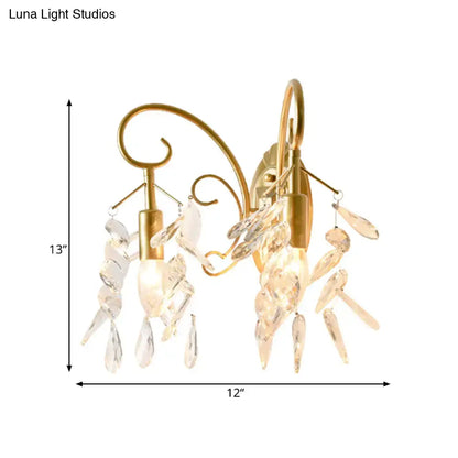 Brass teardrop crystal sconce with hanging prisms by Decorbites on Tampa Home & Garden Store