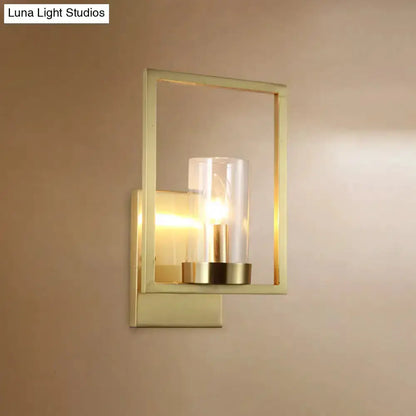 Contemporary brass wall light with clear glass cylinder shade for bedroom by Decorbites on Tampa Home & Garden Store