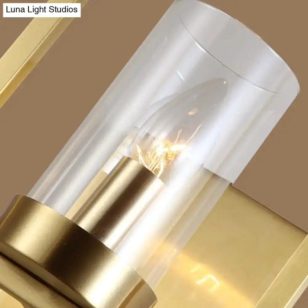 Brass wall light with clear glass cylinder, modern bedroom fixture Decorbites on Tampa Home & Garden Store