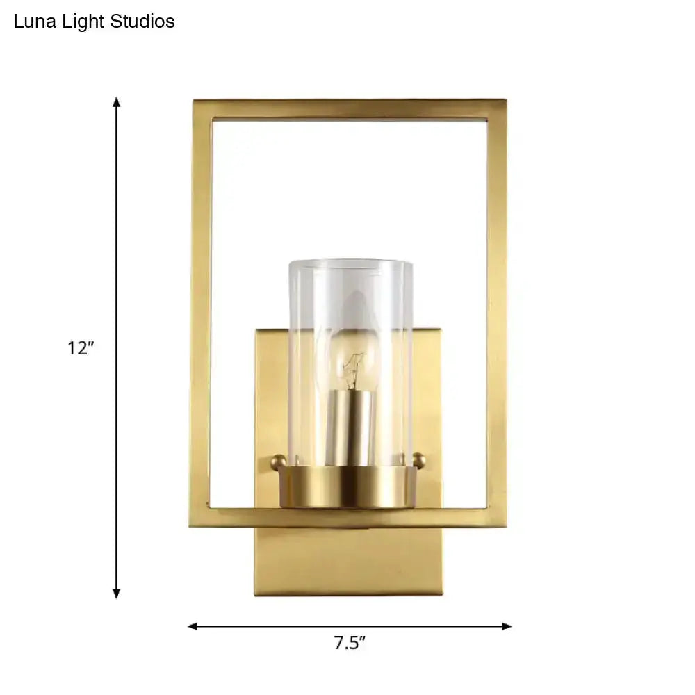 Contemporary brass wall light with clear glass cylinder shade Decorbites on Tampa Home & Garden Store