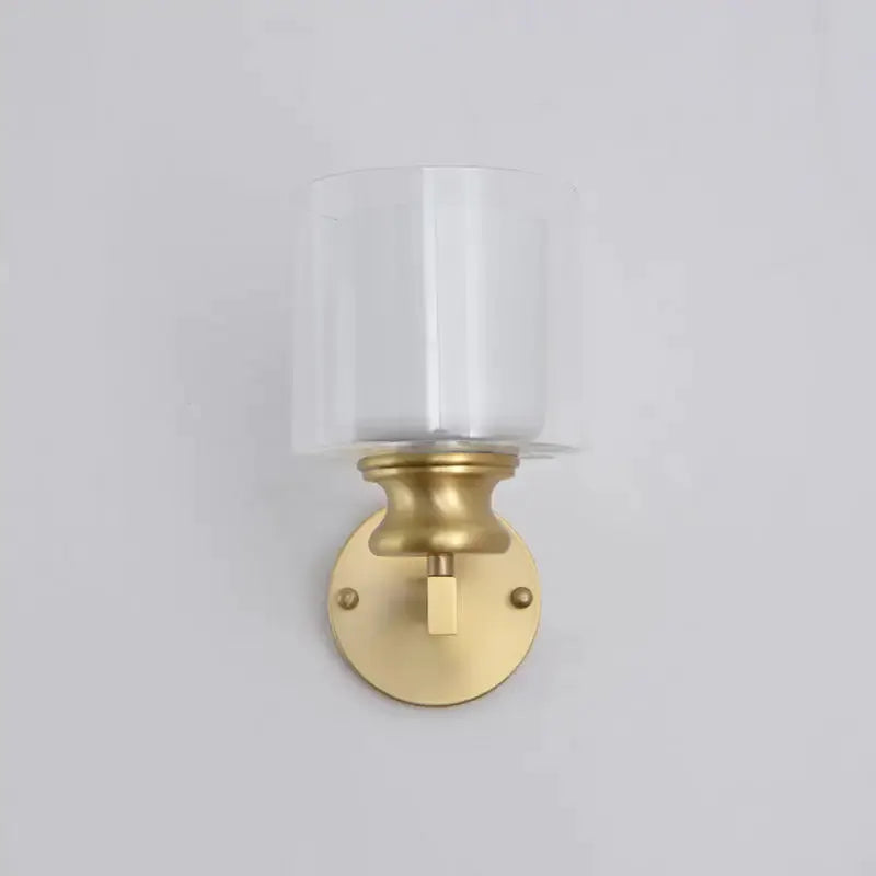 Contemporary brass wall-mounted light fixture with frosted glass shade by Decorbites on Tampa Home & Garden Store