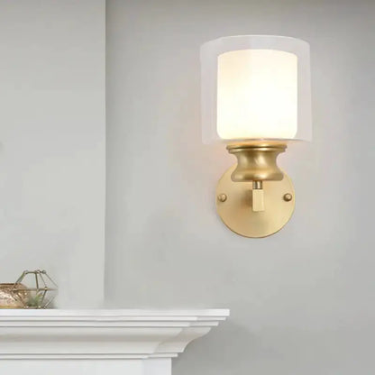 Contemporary brass wall-mounted light fixture with frosted glass shade Decorbites on Tampa Home & Garden Store