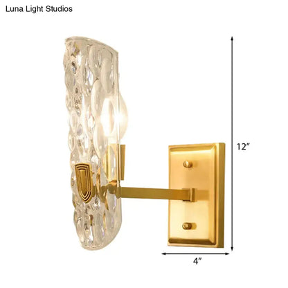 Brass water glass wall sconce by Decorbites with crystal bubble shade on Tampa Home & Garden Store
