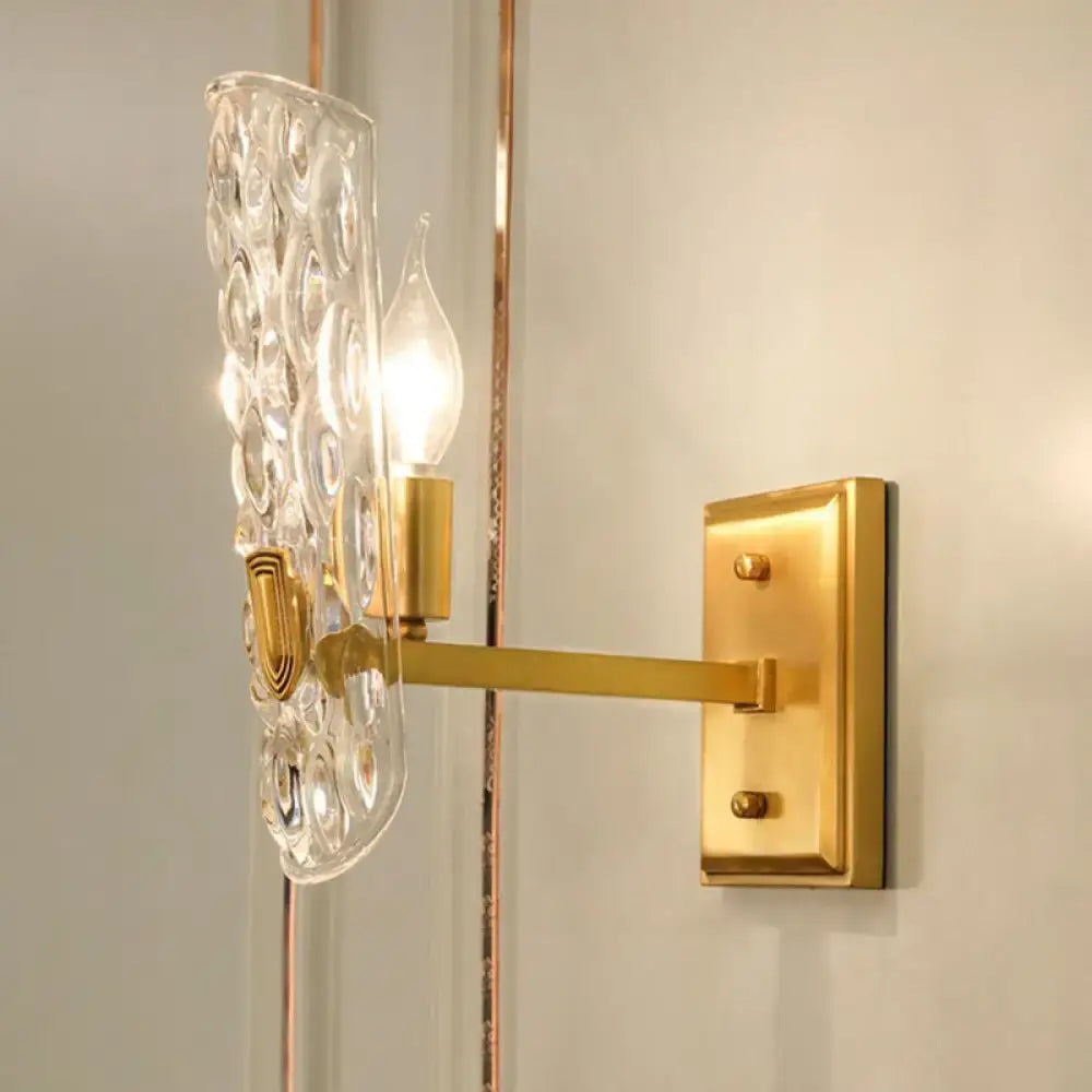 Brass Water Glass Wall Sconce by Decorbites with bubble glass shade and gold backplate on Tampa Home & Garden Store