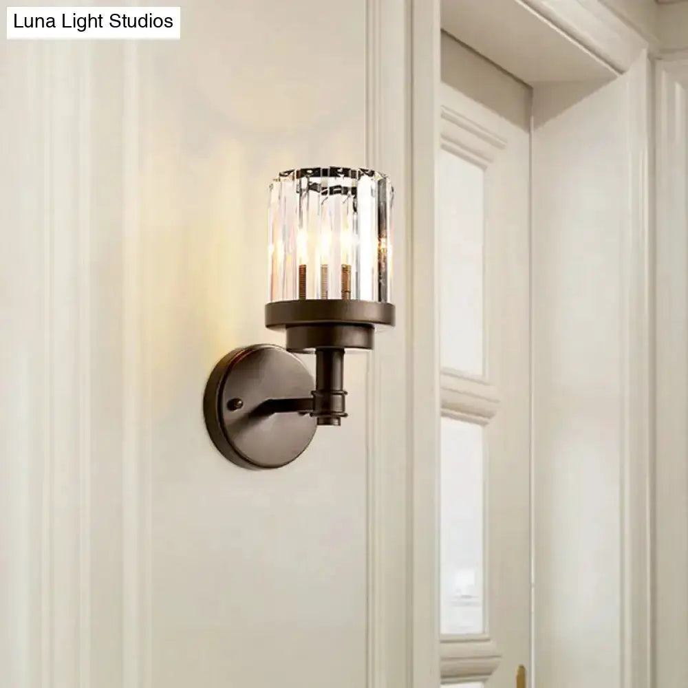 Contemporary bronze wall sconce with ribbed crystal shade for hallway lighting on Tampa Home & Garden Store