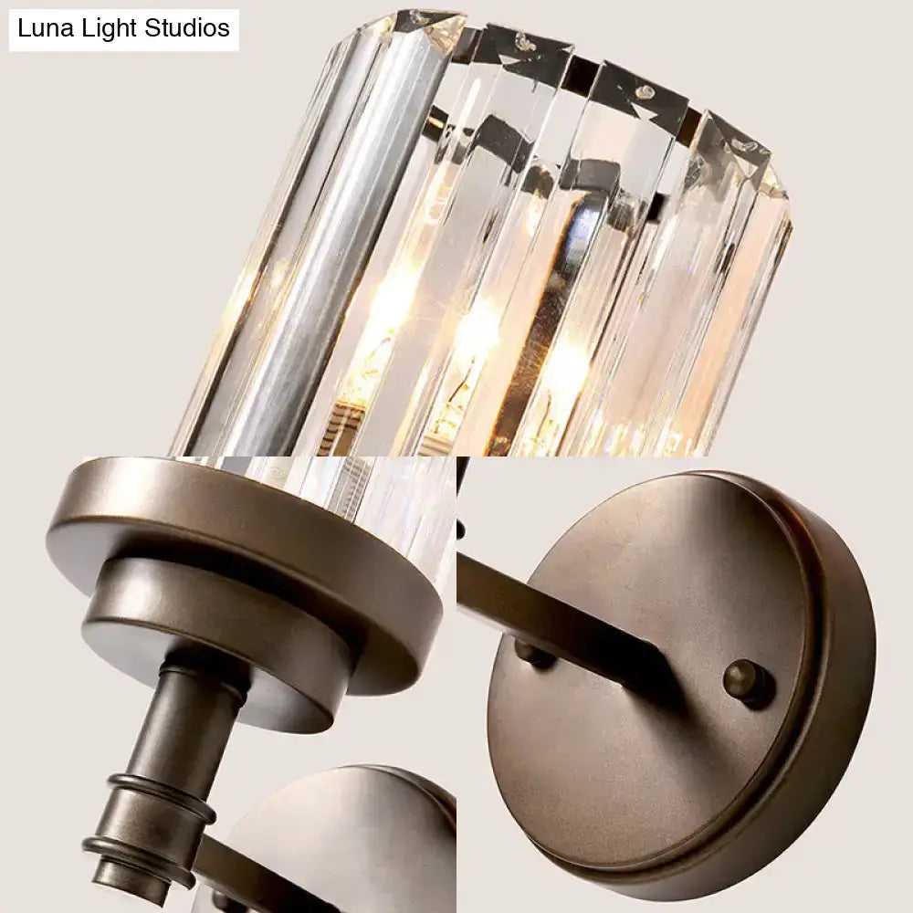 Contemporary bronze wall sconce with ribbed crystal shade by Decorbites for hallway on Tampa Home & Garden Store