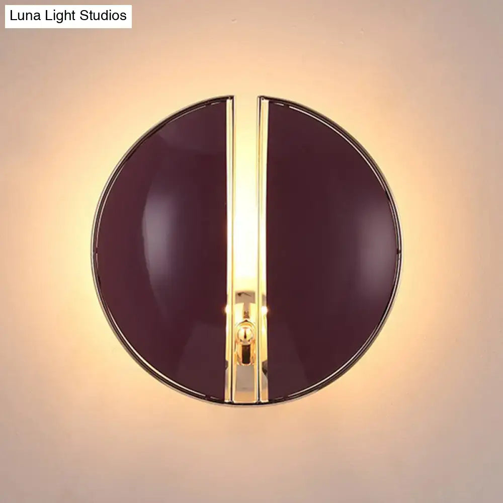 Decorbites Burgundy Gold Wall Sconce, circular burgundy glass with gold center, warm glow on Tampa Home & Garden Store
