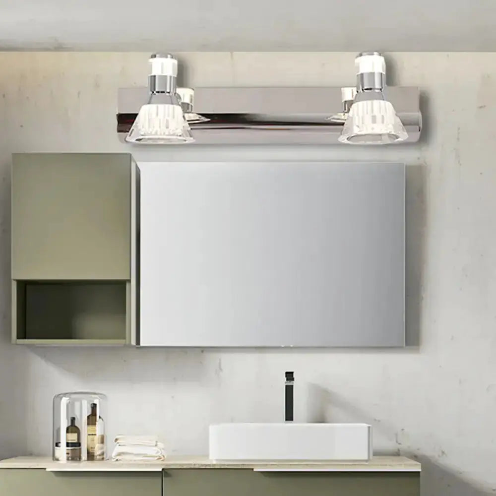 Contemporary chrome conic sconce lights with crystal glass shades above bathroom vanity on Tampa Home & Garden Store