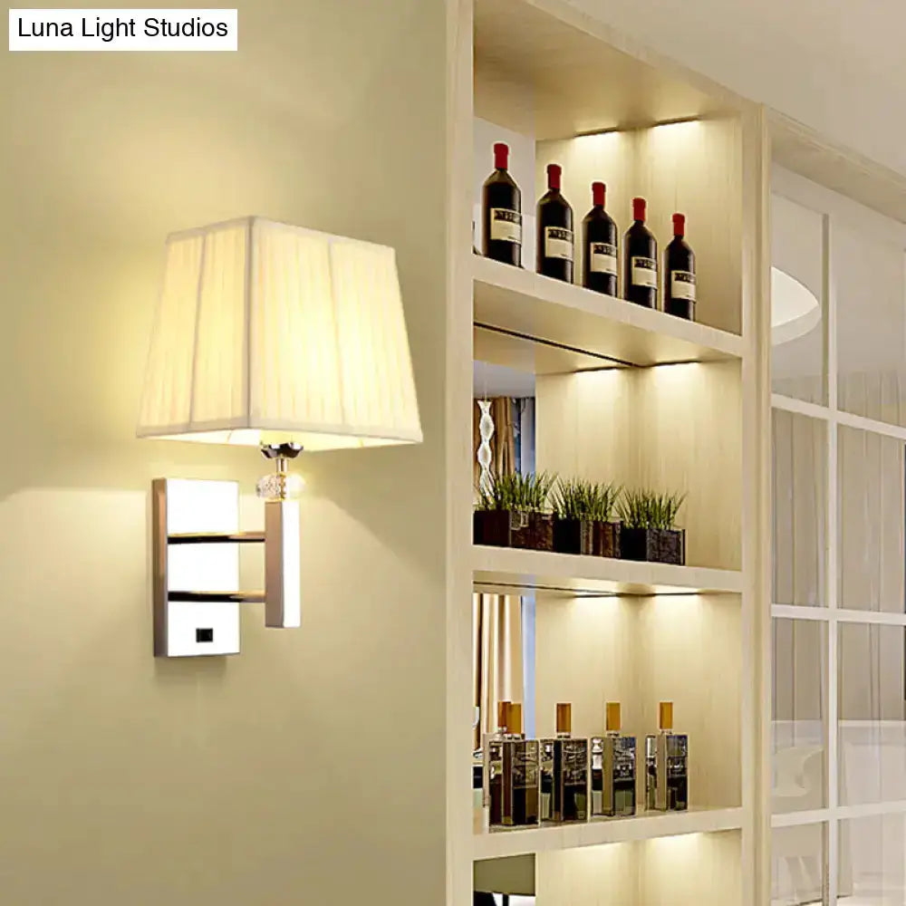 Contemporary chrome LED wall sconce with white fabric shade for bedrooms by Decorbites on Tampa Home & Garden Store