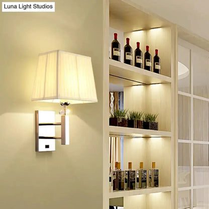 Contemporary chrome LED wall sconce with white fabric shade for bedrooms by Decorbites on Tampa Home & Garden Store
