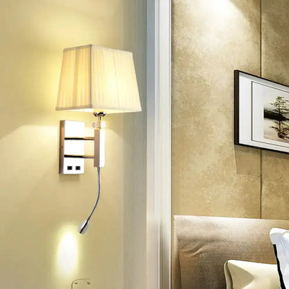 Contemporary chrome LED bedroom sconce by Decorbites with beige pleated shade on Tampa Home & Garden Store