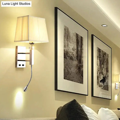 Pair of chrome LED wall sconces with fabric shades and adjustable reading lights on Tampa Home & Garden Store