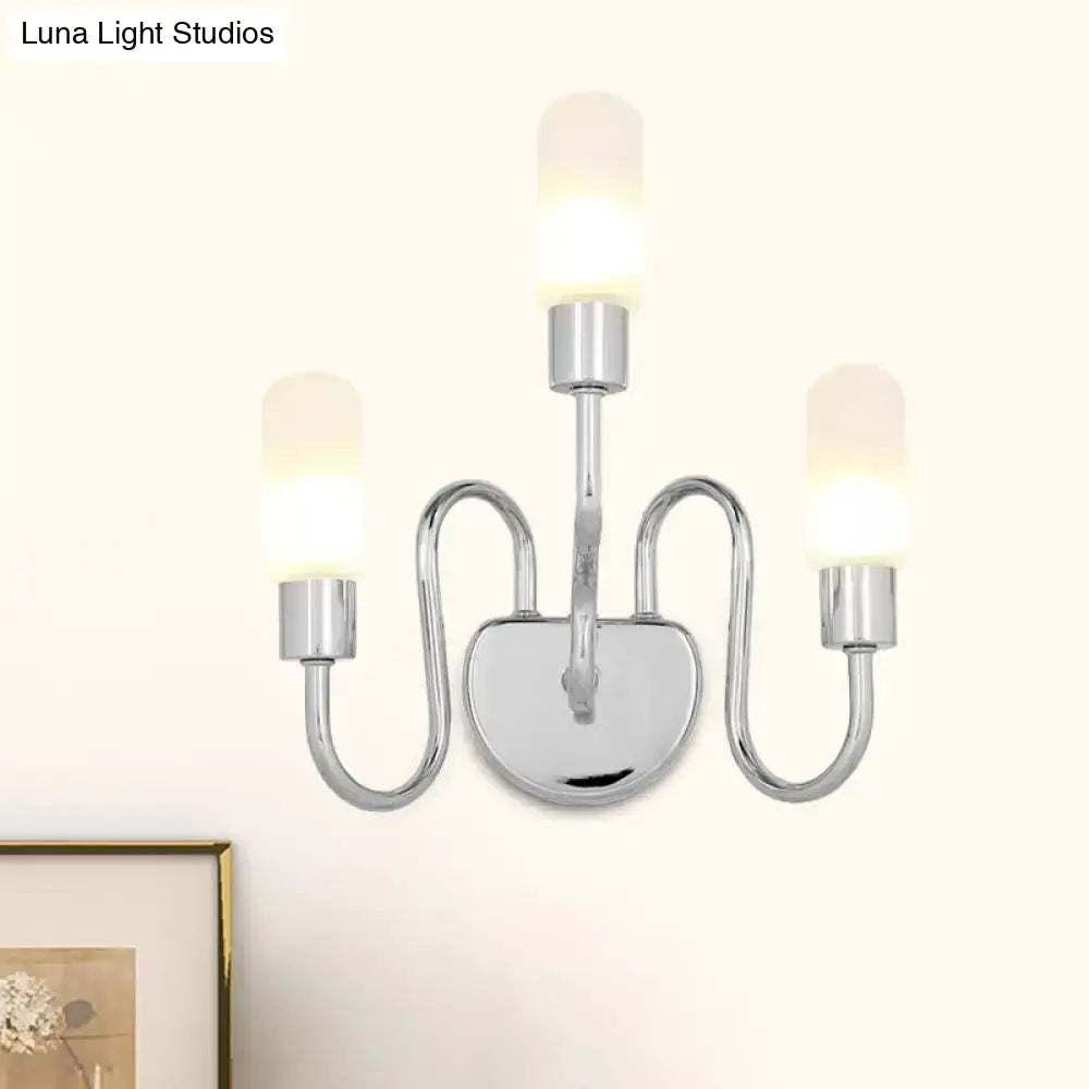 Chrome milk-glass three-light sconce with curved arms and round backplate on Tampa Home & Garden Store