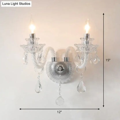 Clear Crystal Faceted Wall Sconce with two arms and hanging prisms by Decorbites on Tampa Home & Garden Store