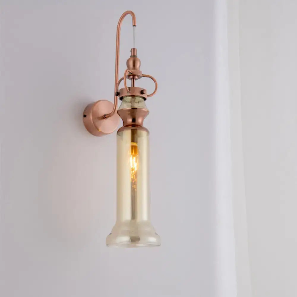 Copper amber glass sconce by Decorbites with curved copper arm and amber glass shade on Tampa Home & Garden Store