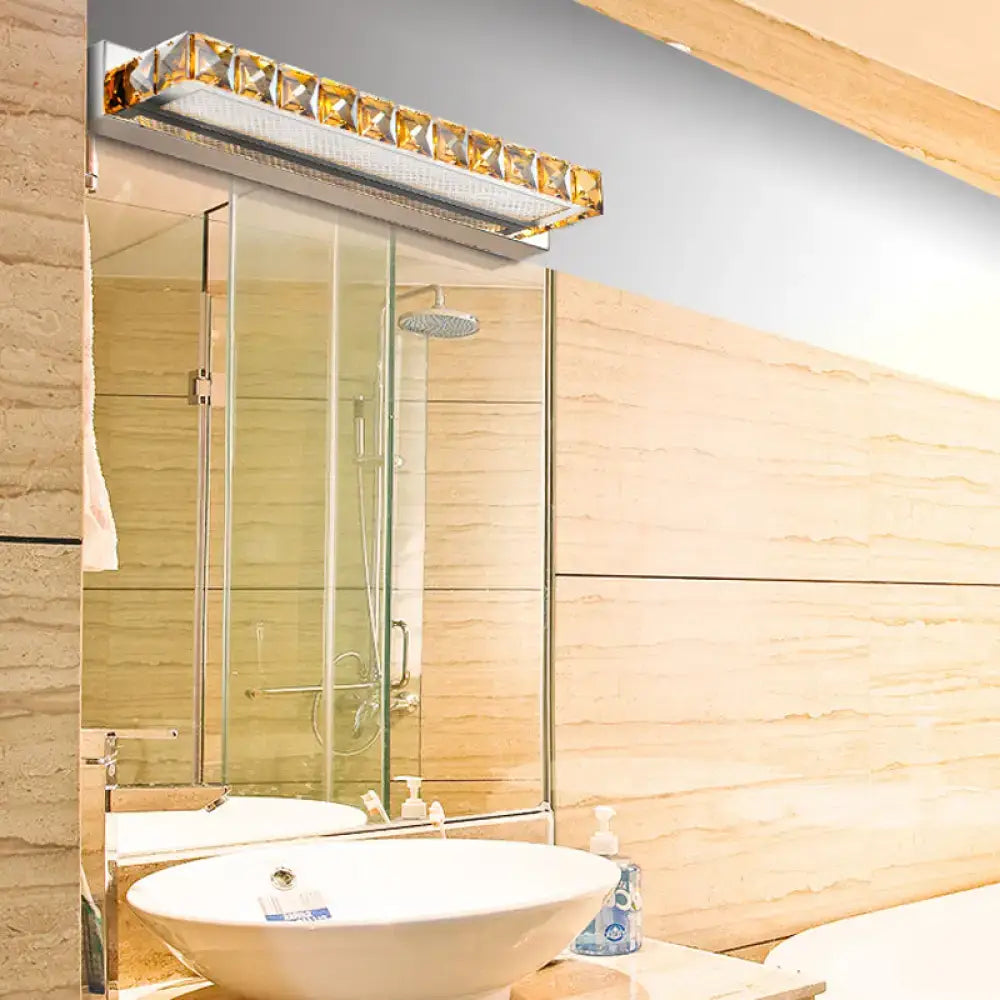 Contemporary crystal gold wall sconce with crystal trim warm white LED for bathroom use on Tampa Home & Garden Store