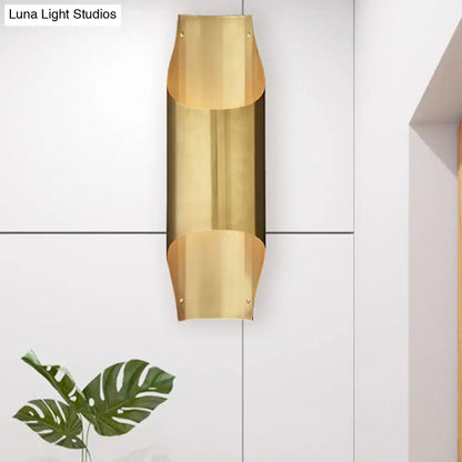 Brass curved single-head wall lamp by Decorbites (Luna Light Studios watermark) on Tampa Home & Garden Store